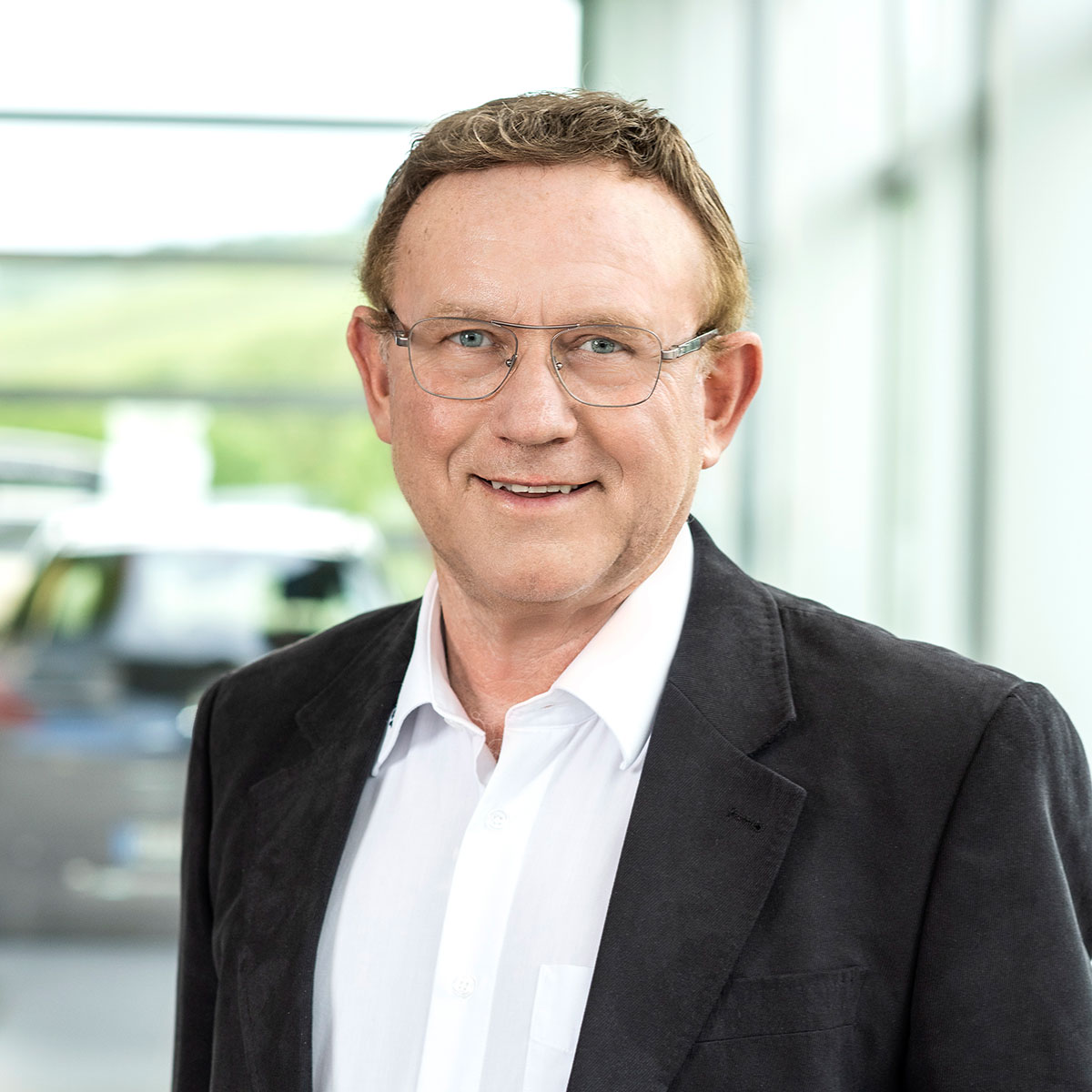 Portrait Geschäftsführer Autohaus Henneberger Senior